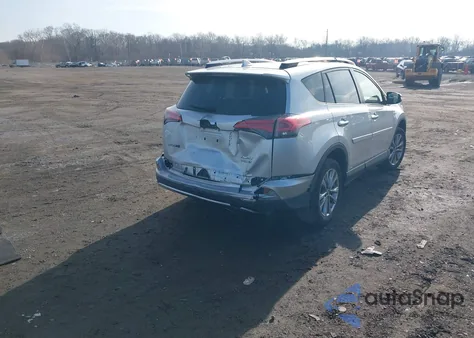 2016 Toyota Rav4 Hybrid Limited z USA, uszkodzony, nr VIN JTMDJREV4GD017099